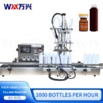 Desktop small fully automatic lifting Baijiu liquid four-head filling machine for edible oil and mineral water, capable of precise large-volume filling - Image 2